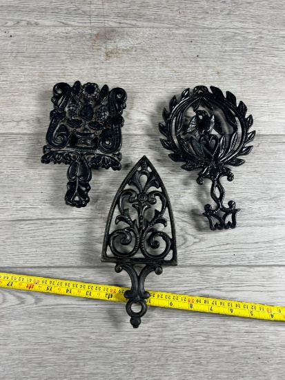 3- Griswold Cast Iron Trivets
