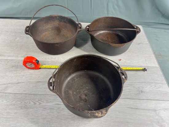 3- Griswold Cast Iron no. 8 Dutch Oven Bottoms, a couple are rough