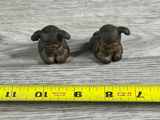 2- Cast Iron Pups labeled Griswold