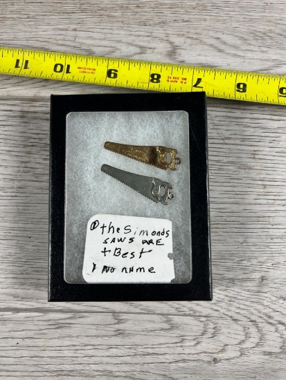 Simmons miniature saw and one unmarked
