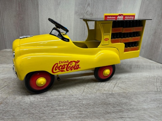 Model Coca-cola pedal car with coke bottles