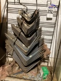 Metal Shelf Bracket Display Filled With Various Sizes of Brackets