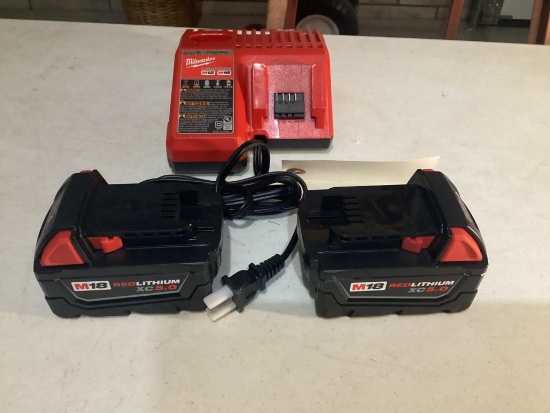 New Unused Milwaukee M18/M12 Charger and 2 M18 XC5 Batteries