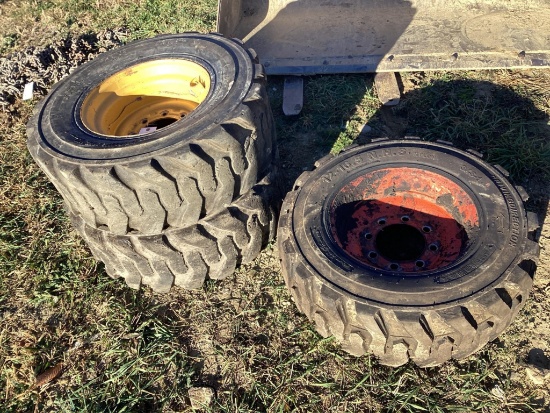 3 Skid loaders Rims and Tires, 12-16.5 N.H.S, 2 Are Power King And 1 Is Solidmax