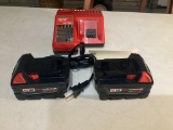 New Unused Milwaukee M18/M12 Charger and 2 M18 XC5 Batteries