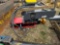Skid loader mounted post pounder