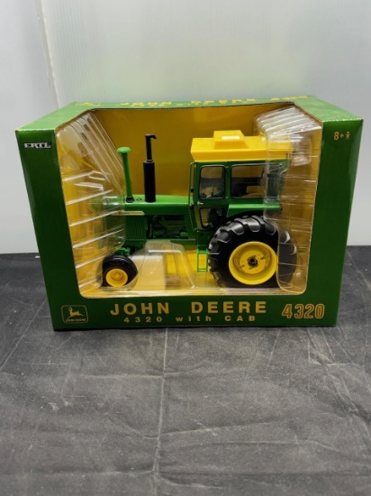1/16 scale John Deere 4320 w cab 25th Anv'l Plow city N.I.B.