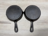 2- Favorite Piquaware No. 3 Cast Iron skillets, both with Smiley Logos
