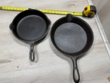 Bullseye Cast Iron Skillet top and Gatemarked Cast Iron Skillet (warped)