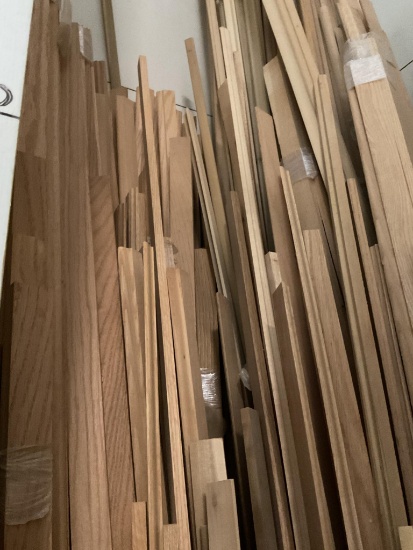 Large Quantity Of Molding In Bin Up To 16' Long and Various Wood Species, Bin Is Approx. 8'x 8'