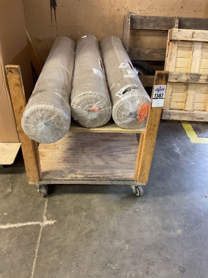 3 Rolls Of Fabric and Wooden Cart