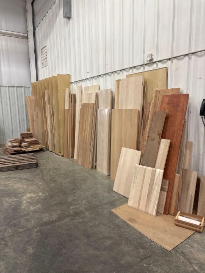 Quantity Of Glue Ups In a Varity Of Sizes and Species Against Wall