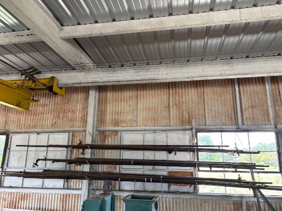 Assorted Steel Pipe with Ball Valves and Fittings on Wall-Mounted Rack