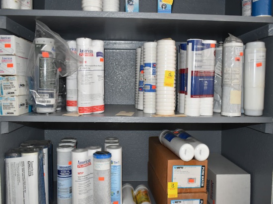 SHELF OF ASSORTED WATER FILTERS