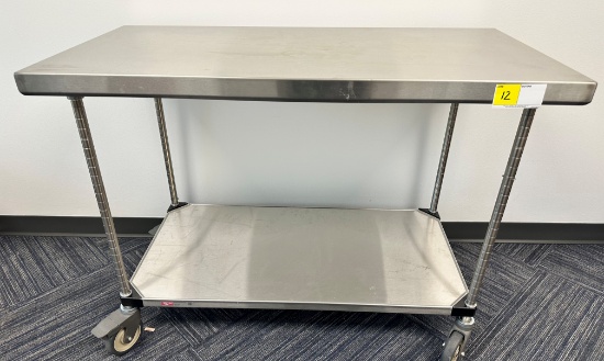 STAINLESS STEEL METRO TABLE ON WHEELS (24"W X 48"L X 34"H)