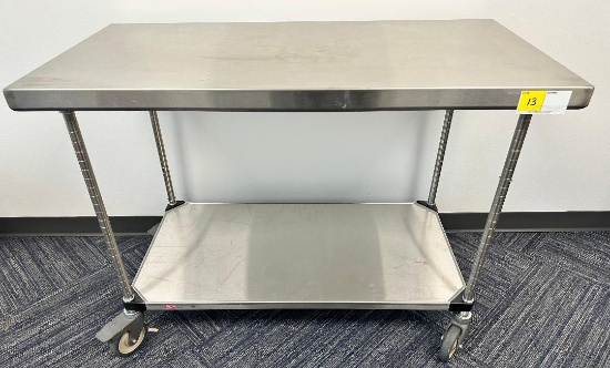 STAINLESS STEEL METRO TABLE ON WHEELS (24"W X 48"L X 34"H)