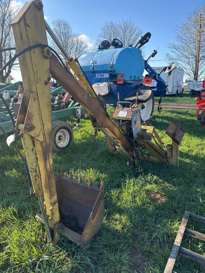 Backhoe attach.