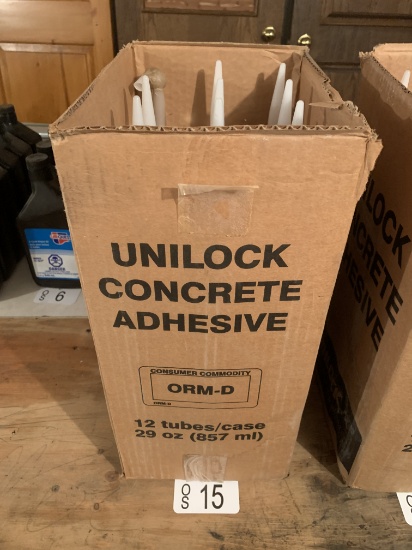 TWELVE NEW UNILOCK CONCRETE ADHESIVE TUBES