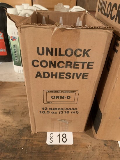 TEN NEW AND USED UNILOCK CONCRETE ADHESIVE TUBES