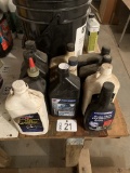 ASSORTED NEW AND USED OILS AND LUBRICANTS