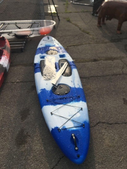 Blue and White Standing Paddle Board