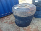(1) 11r17.5 tire on rim, (3) 11r17.5 tires