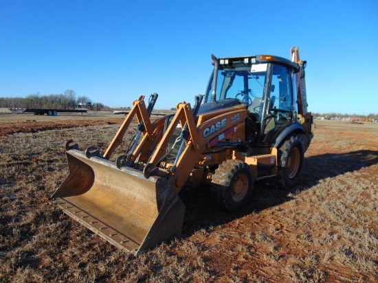 2013 Case 580 Super N Loader Backhoe, s/n 586043, g.p bkt, cab, air, hour meter reads 1856 hrs, 18"