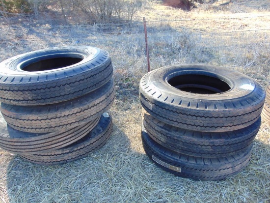 (7) 10.00-22 tires unused