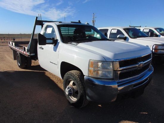 2009 Chevy 3500 4x4 Flatbed, s/n 1gbj34k78e194718, v8 gas eng, auto trans, od reads 153871 miles.