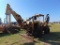 1989 Vermeer M475 Trencher, s/n 1593. hour meter reads 689 hrs, front hoe attachment, canopy,