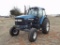 1996 NEW HOLLAND 8360 FARM TRACTOR, S/N 037225B, CAB, HOUR METER READS 4041 HRS, PTO, (2) REMOTES
