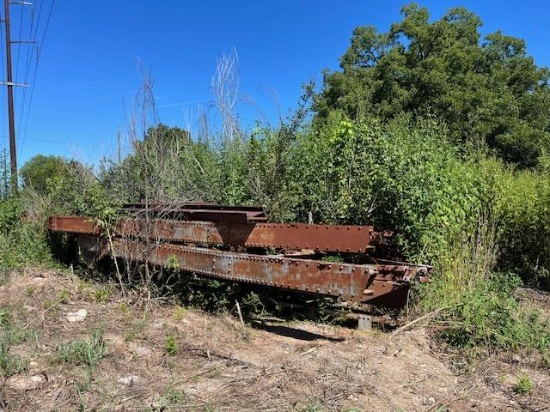 OLD BRIDGE RAISED SIDES, APPROX 40' LONG AND 11' TALL, BRIDGE IS IN (4) HALVES, SELLS OFFSITE