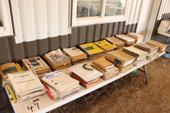 ASSORTED EQUIPMENT MANUALS,...( ALL BOOKS ON THE TABLE, TABLE NOT INCLUDED)