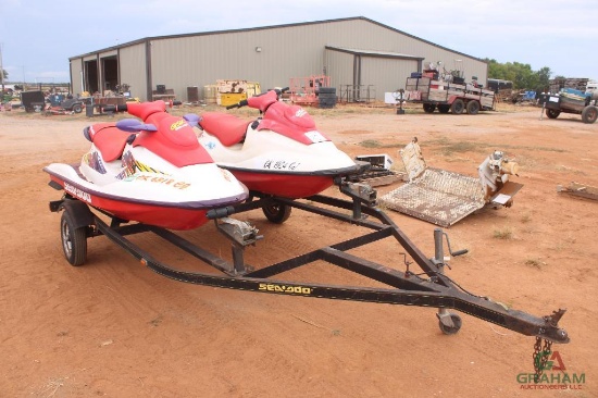 (2) SEA DOO JET SKIS ON S/A TRAILER, S/N ZZN58868A797 & ZZN55647A793, ONE HAS TITLE, THE OTHER IS