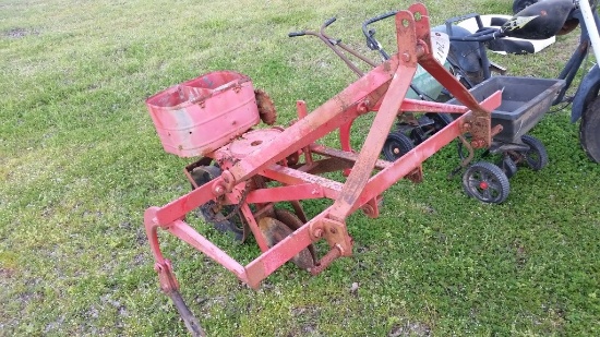 ONE ROW CULTIVATOR AND COLE PLANTER