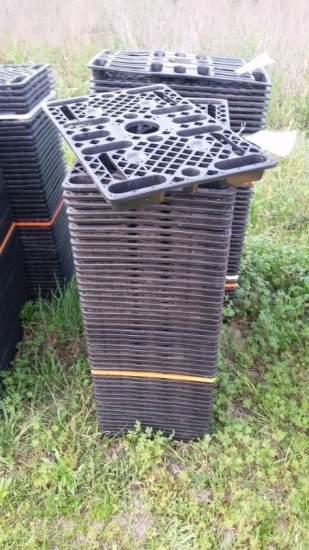 STACK OF PLASTIC FLATS
