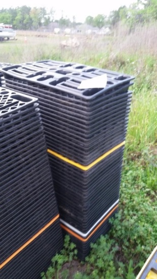 STACK OF PLASTIC FLATS