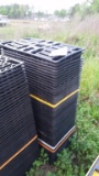 STACK OF PLASTIC FLATS