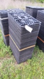 STACK OF PLASTIC FLATS