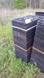 STACK OF PLASTIC FLATS