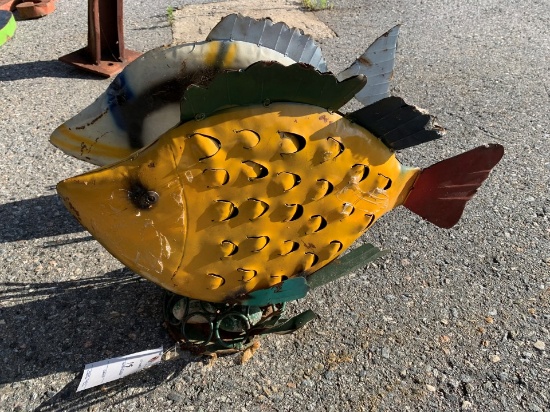 yellow metal bobble fish