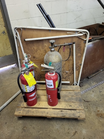 3 fire extinguishers, dolly, & folding table