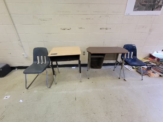 2 small metal desks, & 2 stationary chairs