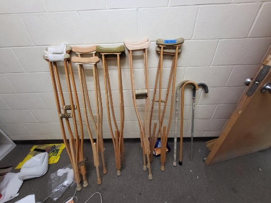 5 sets of crutches, 3 walking canes