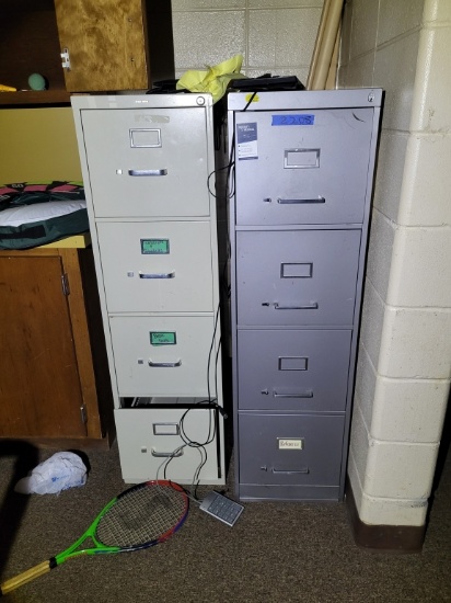 2 metal filing cabinets