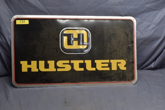 Hustler metal sign