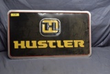 Hustler metal sign