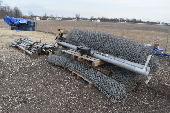 Chainlink fence with gate rollers and post.  4-hole plates on bottom of pos