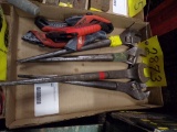 Assorted used tools: box cutters and wrenches