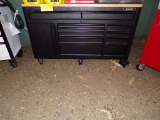 Husky 60in X 24in, black metal tool cabinet  on casters w/ electric